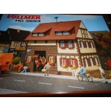 Siedlungshaus mit Fachwerk